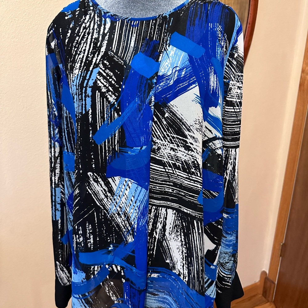 Beautiful blue, black, and white sheer blouse with black tank.